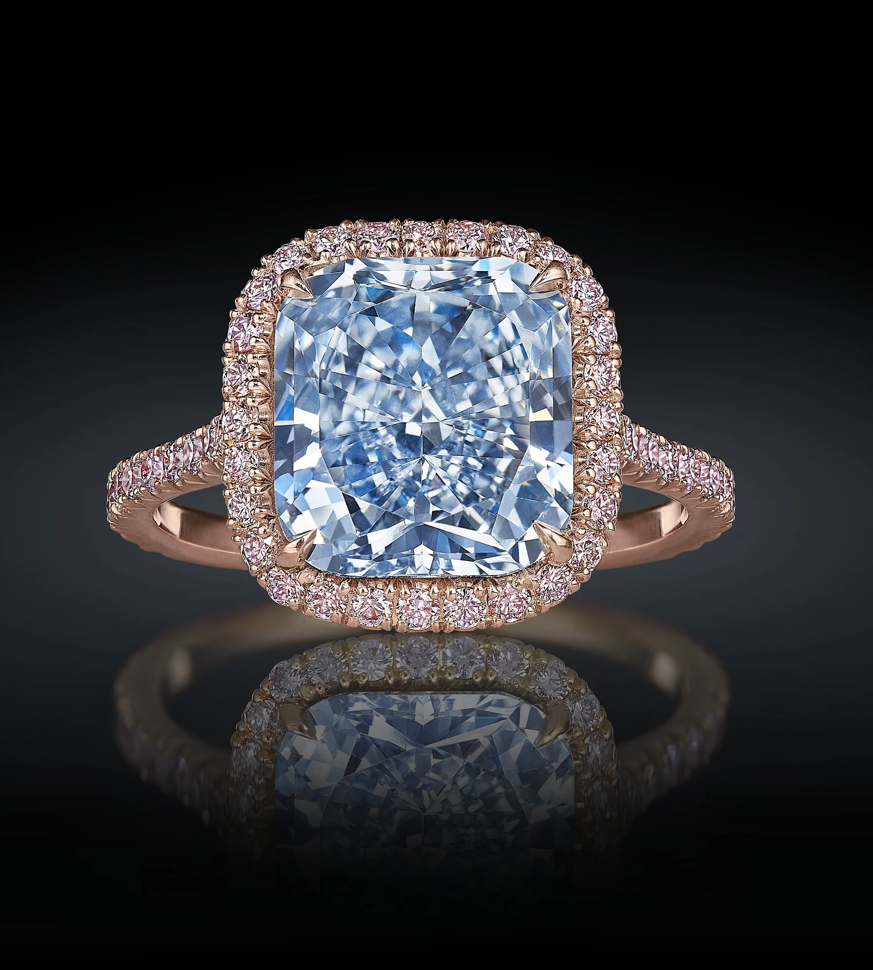A 3.79-carat vivid blue diamond ring with a pink diamond halo